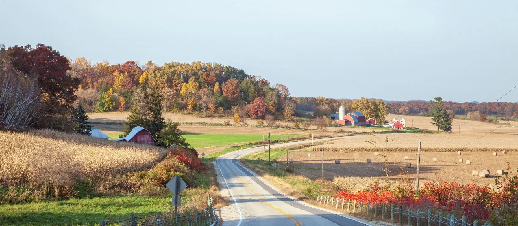 Scenic curvy road in the midwest during the fall